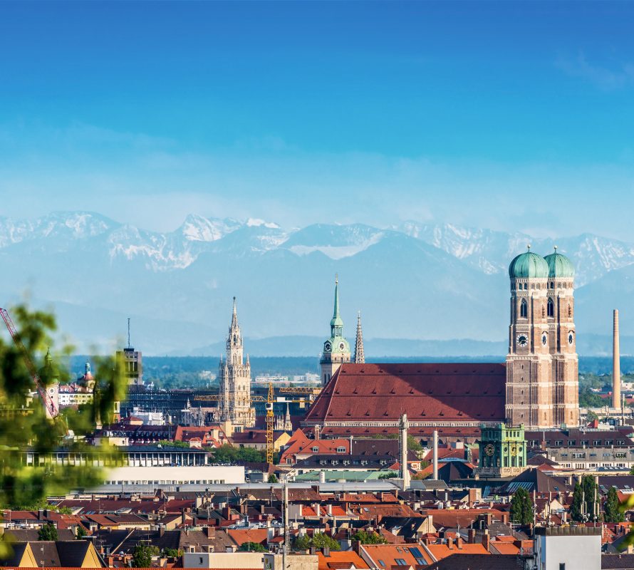Landscape of Munich with German Alps on the background